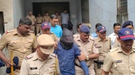 The accused janitor was re-arrested in the second school girl's sexual assault case and was produced in the court on Friday. (Express Photo)