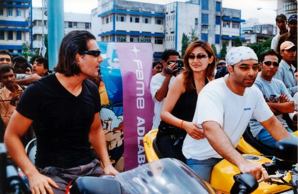 John Abraham, Rimi Sen and Uday Chopra during the promotion of Dhoom in 2004