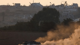 A tank manoeuvres near the Israel-Gaza border, amid the ongoing conflict between Israel and Hamas, in Israel, August 7, 2024. REUTERS
