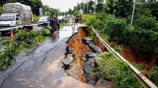 A portion of a road got damaged due to heavy rainfall, on the outskirts of Agartala, Wednesday, Aug. 21, 2024. (PTI Photo)