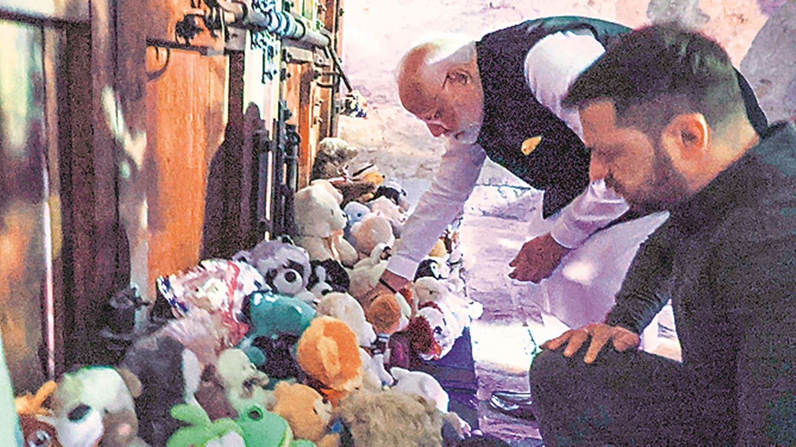 With silent prayer, PM places a toy at children’s memorial With silent prayer, PM places a toy at children’s memorial