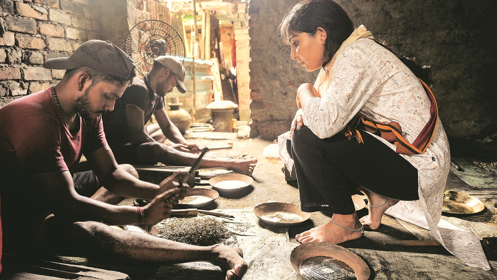 Art practitioner Kirti Kumari at a bell metal workshop in Balakati, Odisha