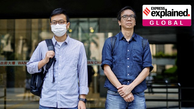 Chung Pui-kuen, former chief editor of the now-shuttered Stand News, and Patrick Lam, former acting chief editor, leave the District Court during the hearing on charges of conspiring to publish seditious publications, in Hong Kong, China on June 27, 2023.