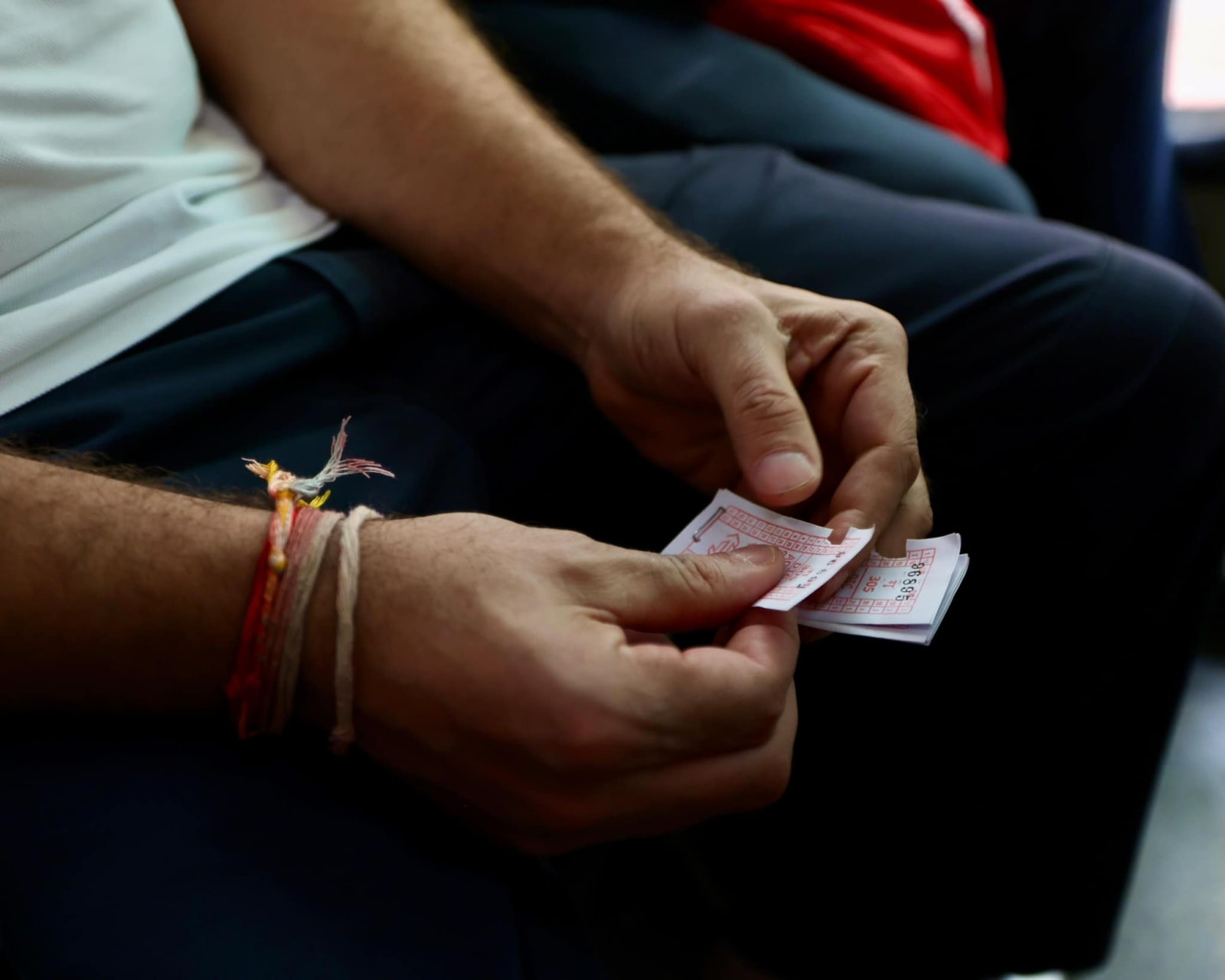 Congress leader Rahul Gandhi holds a DTC bus ticket in his hand. (Photo: Facebook)