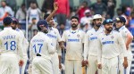 India's Ravichandran Ashwin with teammates shows the ball after taking 5 wickets on the fourth day of the first Test cricket match between India and Bangladesh at M. A. Chidambaram Stadium, in Chennai. (PTI)