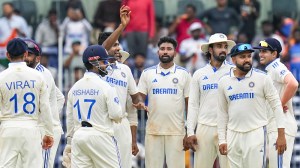 India's Ravichandran Ashwin with teammates shows the ball after taking 5 wickets on the fourth day of the first Test cricket match between India and Bangladesh at M. A. Chidambaram Stadium, in Chennai. (PTI)