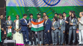 The Indian contingent are handed the Nona Gaprindashvili Cup at the end of the Chess Olympiad in Chennai in 2022. (PHOTO: FIDE via Lennart Ootes)