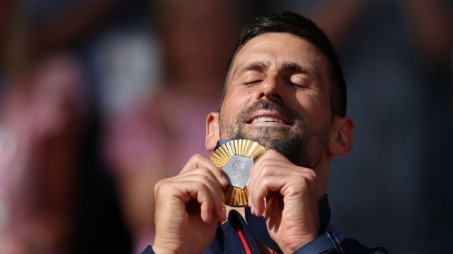 Djokovic completed a Career Golden Slam, just the third man to do so in men's singles apart from Andre Agassi and Rafael Nadal, when he beat Carlos Alcaraz in the gold medal match of the Paris Olympics last year. (Reuters Photo)