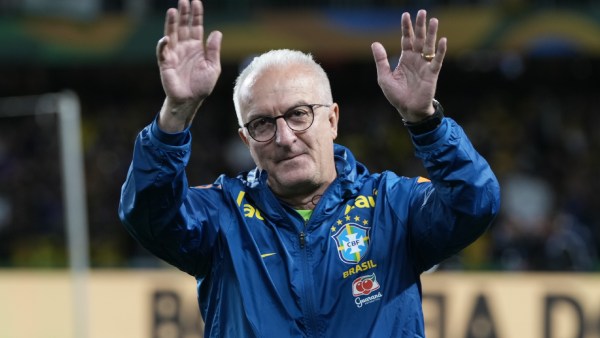 Brazil's coach Dorival Junior enters the field prior to a qualifying soccer match for the FIFA World Cup 2026 against Ecuador at Couto Pereira Stadium in Curitiba, Parana state, Brazil