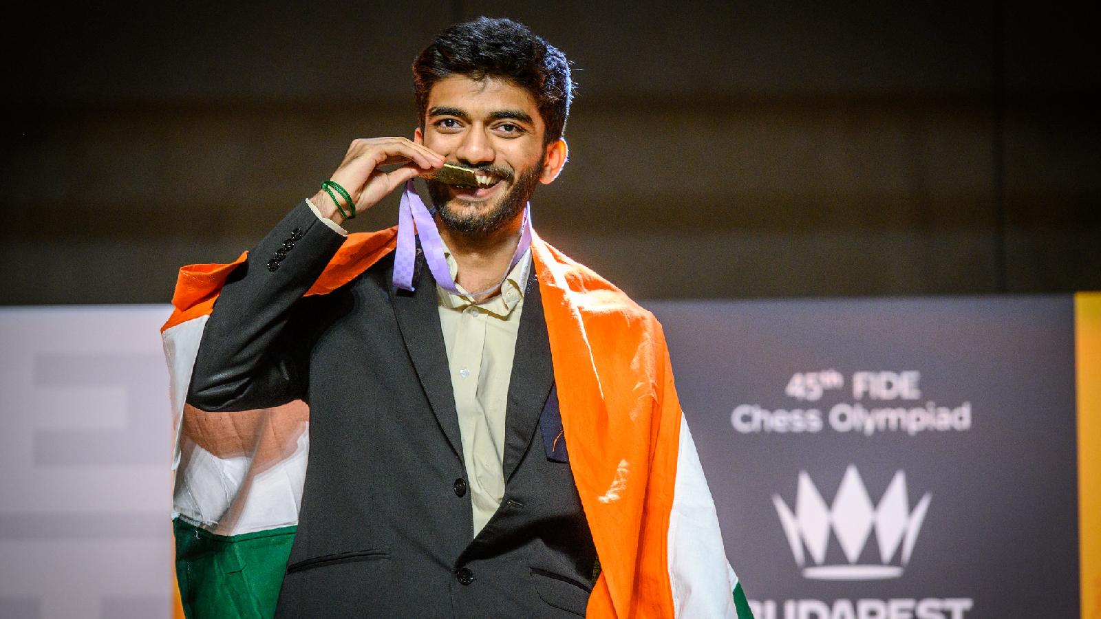 India's Gukesh poses with his individual gold medal on board 1 in the open section at the Chess Olympiad in Budapest. (PHOTO: FIDE/ Michal Walusza)