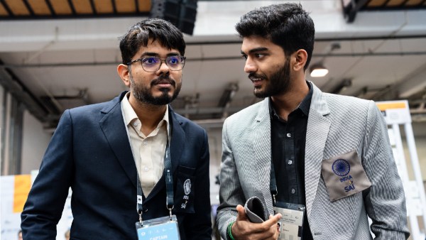 Chess Olympiad: D Gukesh (right) talks to India's team captain Srinath Narayanan after a game at the Olympiad in Budapest. (PHOTO: FIDE via Maria Emelianova)