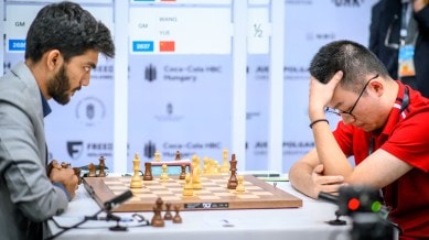India's Gukesh takes on China's Wei Yi on the top board in the seventh round of the Chess Olympiad on Wednesday. (PHOTO: Michal Walusza/FIDE)