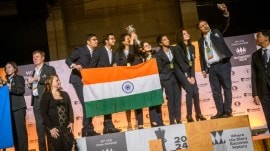 The team of Harika Dronavalli, R Vaishali, Divya Deshmukh, Vantika Agrawal and Tania Sachdev after winning the gold at the 2024 Chess Olympiad. (Michal Walusza | FIDE)