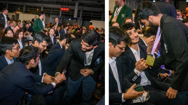 Members of the India's open team share lighter moments at the trophy ceremony after the Chess Olympiad in Budapest. (PHOTO: FIDE/ Michal Walusza)