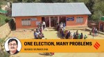 Voters stand in queues to cast votes at a polling station during the first phase of Jammu and Kashmir Assembly elections, in Kulgam district,