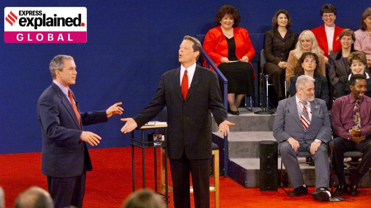 George W. Bush, left, and Al Gore during a town hall debate in St. Louis, Oct. 17, 2000.