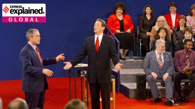 George W. Bush, left, and Al Gore during a town hall debate in St. Louis, Oct. 17, 2000.