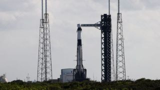 A SpaceX Falcon 9 rocket is prepared to launch NASA's astronaut Nick Hague and Roscosmos cosmonaut Alexander Gorbunov on the Crew-9 mission.