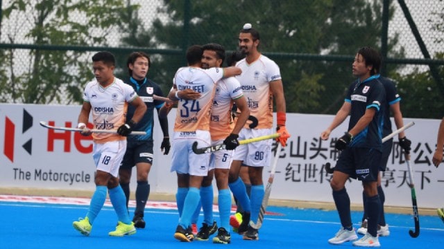 Sukhjeet and Abhishek celebrate a goal from India against Japan in their 5-1 win at the Asian Champions Trophy. (Photo: Hockey India)