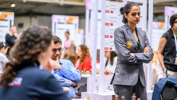 Tania Sachdev takes on Mitra Hejazipour in the fourth round of the Chess Olympiad. (PHOTO: FIDE/Michal Walusza)