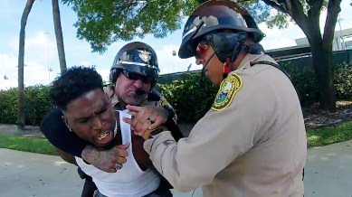 Tyreek Hill racism america handcuff