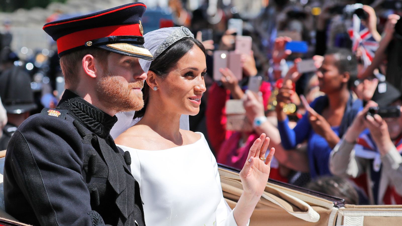 Harry and Meghan discussing Diana's surname