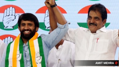 Wrestler Bajrang Punia with Congress MP K C Venugopal. (Express photo by Amit Mehra)