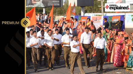 Volunteers of Rashtriya Swayamsevak Sangh march during the organisation's Karyavistar Kumbh programme in Rajkot.