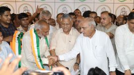 Laxman Napa joins Congress in the presence of Bhupinder Singh Hooda. Express