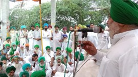 Dharna by BKU Dakaunda(Burjgill) at Ghuman Kalan toll plaza. (Express Photo by Raakhi Jagga)