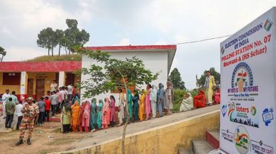 J&K Assembly Elections 2024 Live Updates: People wait in queues to cast their votes at a polling booth during the second phase of Jammu & Kashmir Assembly elections, at a village near the Line of Control (LoC), at Nowshera in Rajouri district.