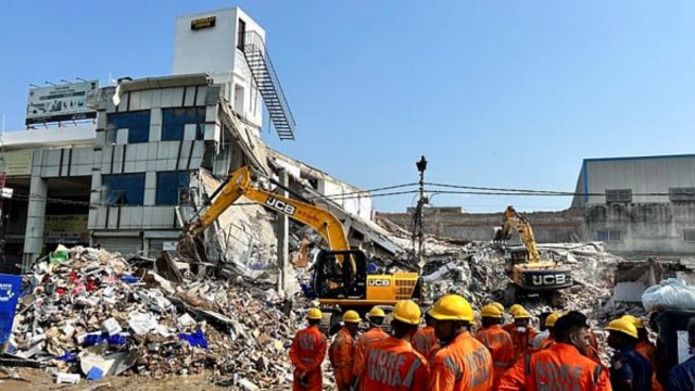 The death toll in the building collapse here has climbed to eight, with rescuers pulling out three more bodies from the debris, officials said on Sunday.