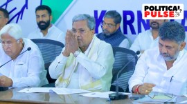 Karnataka CM Siddaramaiah (centre) with his deputy D K Shivakumar. (R)