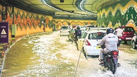 Pragati Maidan Tunnel case, Delhi L-G House, pragati maidan tunnel, arbitration process, void agreement, delhi PWd, delhi high court, aap, Indian express news