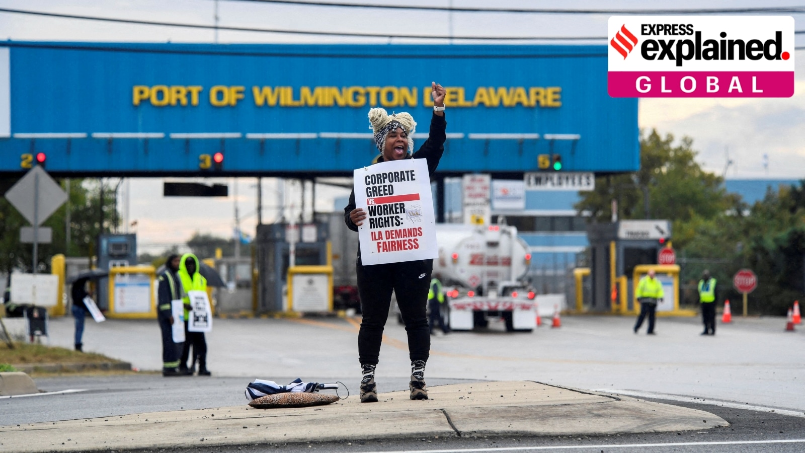 A dockworker demonstrates after a shipping port strike went into effect across the East Coast at the Port of Wilmington, Delaware, U.S., October 1, 2024. REUTERS/Matthew Hatcher TPX IMAGES OF THE DAY