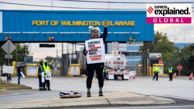 A dockworker demonstrates after a shipping port strike went into effect across the East Coast at the Port of Wilmington, Delaware, U.S., October 1, 2024. REUTERS/Matthew Hatcher TPX IMAGES OF THE DAY