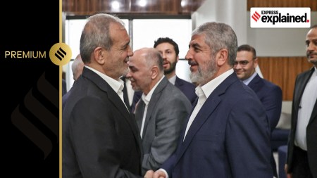 Iran's President Masoud Pezeshkian meets with Hamas leader Khaled Mashal, in Doha, Qatar, October 2, 2024.