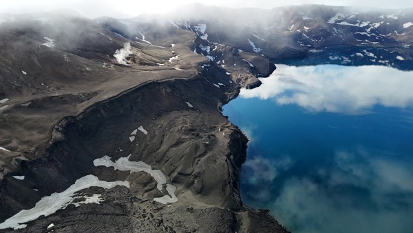 A drone presumption    shows Oskjuvatn, a caldera water  created during the 1875 eruption of the Askja volcano, successful  Vatnajokull National Park, Iceland, August 10, 2024. REUTERS/Stoyan Nenov To lucifer  Special Report CLIMATE-CHANGE/GLACIER-VOLCANOES