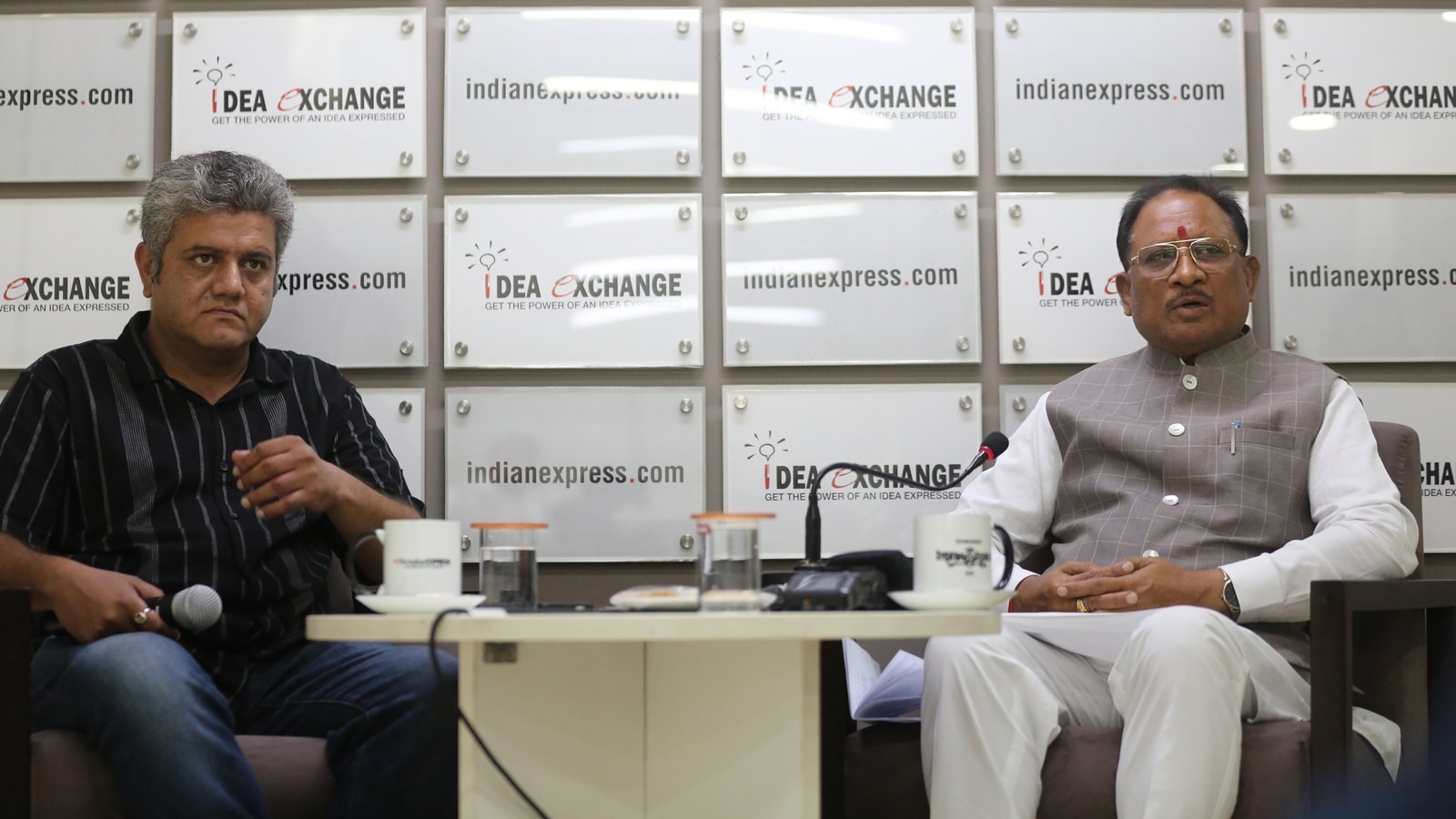 Chhattisgarh Chief Minister Vishnu Deo Sai (right) in conversation with Vikas Pathak, Deputy Associate Editor, The Indian Express in an Idea Exchange held on the day of Haryana Results 2024. (Express photo by Tashi Tobgyal)