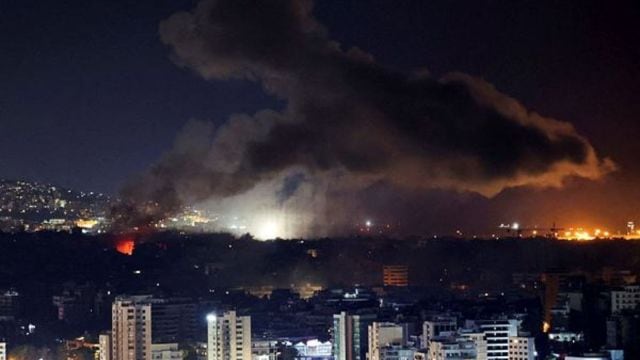 Smoke rises over Beirut's southern suburbs after a strike, amid ongoing hostilities between Hezbollah and Israeli forces, as seen from Sin El Fil, Lebanon,