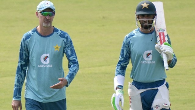 Pakistan's Test squad  manager  Jason Gillespie, left, chats with Test team's skipper Shan Masood during a signifier    session, successful  Rawalpindi, Pakistan, Wednesday, Oct. 23, 2024. (AP Photo)