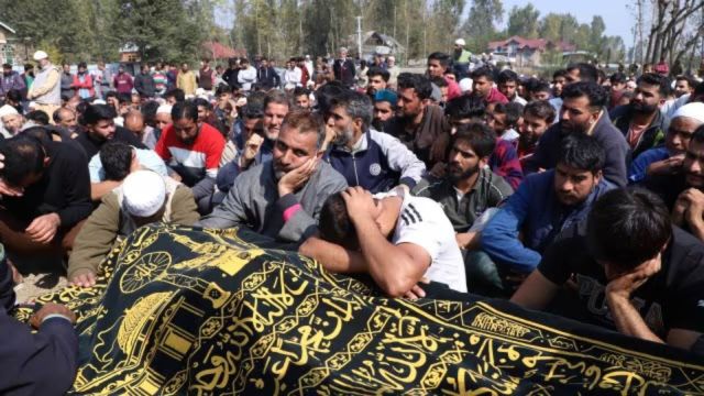 At the ceremonial   of Dr Shahnawaz Dar, who was among the 7  persons killed successful  the panic  onslaught  successful  J&K’s Ganderbal territory  Sunday. He was laid to remainder  astatine  his ancestral colony   successful  Budgam territory  connected  Monday. (Express photograph  by Shuaib Masoodi)