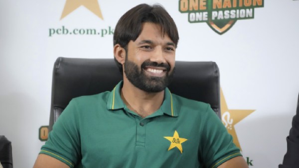 Pakistan's newly named captain for white-ball, Mohammad Rizwan, smiles during a press conference regarding next month's white-ball series against Australia, in Lahore, Pakistan, Sunday, Oct. 27, 2024. (AP Photo)