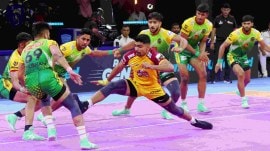 Telugu Titans' Pawan Sehrawat in action vs Patna Pirates in the PKL