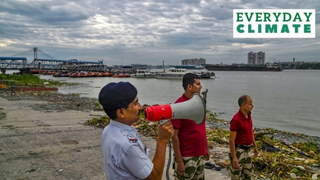 Officials of the River Traffic Police and Disaster Management Group (DMG) marque   announcements connected  the banks of the Hooghly stream  up  of up  of Cyclone 'Dana' landfall, successful  Kolkata, Wednesday, Oct. 23, 2024.