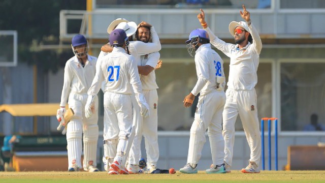 Leg-spinner Shubham Agarwal is mobbed by his teammates after he picked up his maiden five-wicket haul against Tamil Nadu on Day 3 of their Ranji Trophy fixture at SNR College grounds in Coimbatore. (Photo Credit: TNCA)