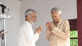 aghuveer Chaudhari is being greeted by trustee of Sabarmati Ashram Preservation and Memorial Trust, Kartikeya Sarabhai.