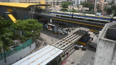 A view of the two girders that Brihanmumbai Municipal Corporation (BMC) launched on the under-construction T-shaped flyover over Malad’s Mith Chowki. (Express photo by Sankhadeep Banerjee)