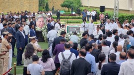 People pay their last respects. (Express Photo by Deepak Joshi)
