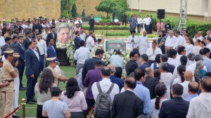 People pay their last respects. (Express Photo by Deepak Joshi)